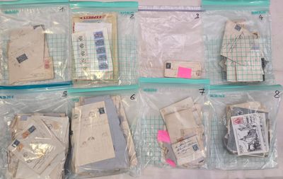 a lot of envelopes in the bags on the table