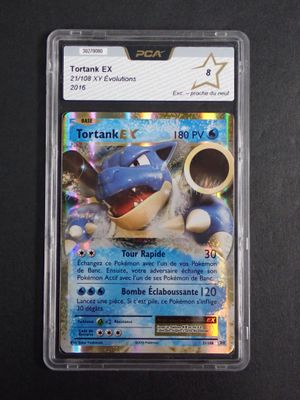 a close up of a pokemon trading card in a plastic case