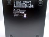 the back of a laptop with a black back panel and a white back panel