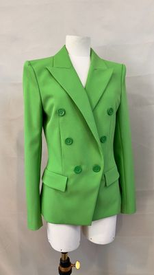 a close up of a green jacket on a mannequin mannequin mannequin mannequin mannequin mannequin mannequin manne