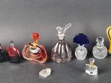 a lot of glass bottles that are sitting on a table