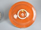 two plates that are sitting next to each other on a table