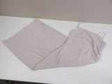 a pair of pink pants on a white table