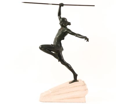 statue of a woman holding a spear on a wooden base