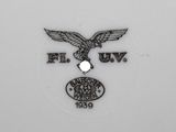 a close up of a plate with an eagle on it
