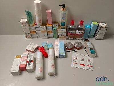 many different types of skin care products laid out on a table