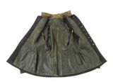 a green leather skirt with black trims and zippers