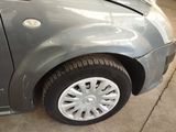 a picture of a car with a denting dent on it