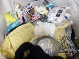 a bag full of items that are in a trash can