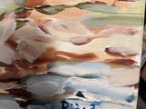 a painting that is on display on a table