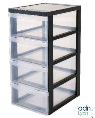 an image of a black and clear drawer with four drawers