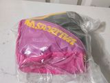 a plastic bag that has a pink and yellow bag inside of it