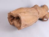 a wooden object that is sitting on a white surface