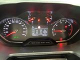 a close up of a car dashboard with various gauges