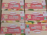 six boxes of babyloo orange flavored yogurt are stacked on top of each other