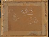painting on easel with chalk writing on it in front of a window