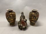 trois vases posés les uns à côté des autres sur une table blanche