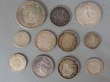 a lot of coins that are sitting on a table