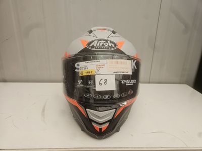 an image of a helmet on a table with a tag on it