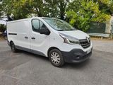 a white van that is parked in the parking lot