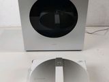 the box is white and has a black top and a silver bottom