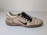 a close up of a pair of shoes on a white surface