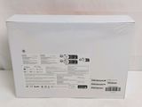 the back of a white box with a black and white logo on it