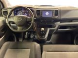 the interior of a car with a steering wheel, dashboard, and dash board