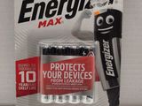 an image of a package of batteries and a pen on a table