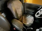 a picture of a car with a steering wheel and a seat in it