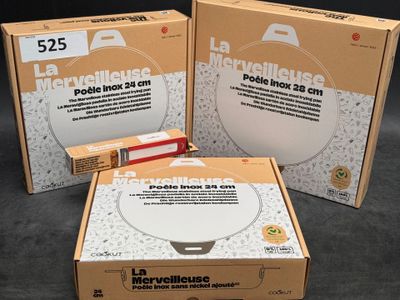three boxes of food sitting on top of a table next to each other