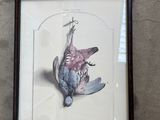 la photo d'une photo représentant un oiseau mort accroché à un mur
