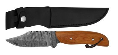 a close up of a knife and sheath on a white background