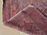 a close up of a rug laying on the ground