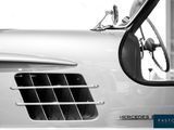 a close up of a car ' s front grill and mirror