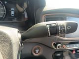 a close up of a steering control in a car