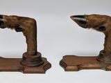 pair of antique wooden dog paw bookends with faux fur
