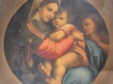 une image d'un tableau représentant une femme tenant un bébé dans ses bras