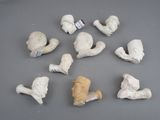 several pieces of clay sitting on top of a table next to each other