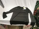 a black shirt sitting on top of a white table
