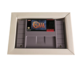 a box with a game inside of it on a white surface