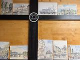a picture of a picture of a city on a window sill