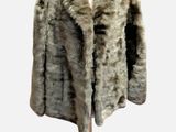 an image of a fur coat on a mannequin