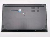 a black laptop with a blue sticker on the back of it