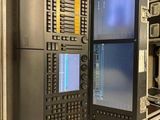 an image of a computer with multiple monitors on it