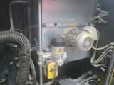 a picture of a machine with a hose attached to it ' s side