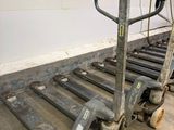a dolly that is sitting in the middle of a room