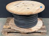 a wooden pallet with a spool on top of it