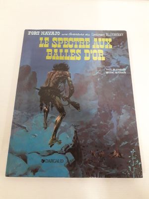 la couverture du livre *Le Secret aux battes d'or*, sur laquelle figure l'image d'un homme