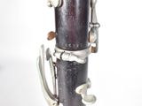 a close up view of a bassoon on a white background